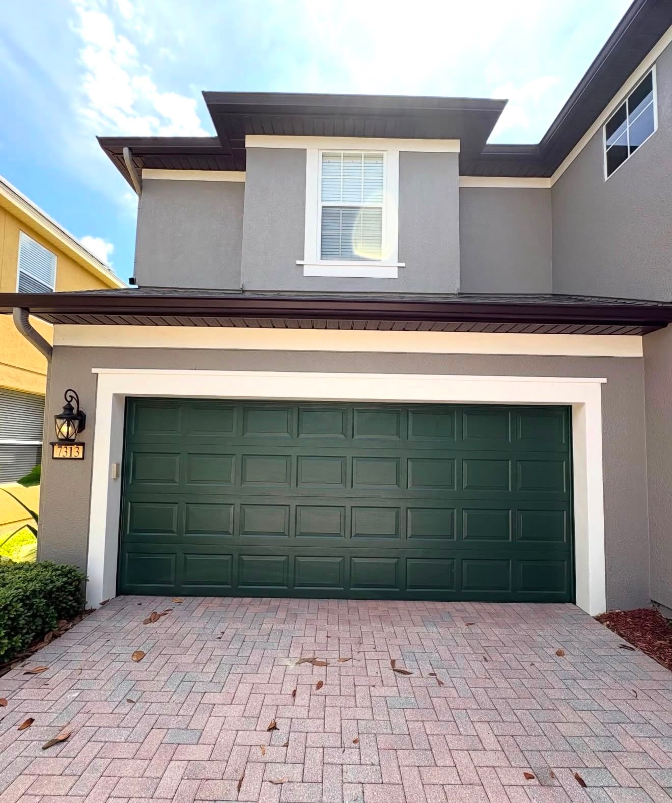 Charcoal gray home with white trim